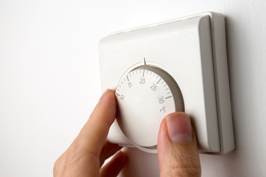 Thermostaat één graad lager